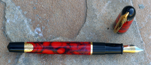WATERMAN'S PHILEAS. Coral and black with BROAD nib.